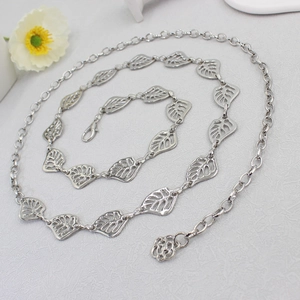 Silver metal waist chain for women with hollow leaf design and floral charm