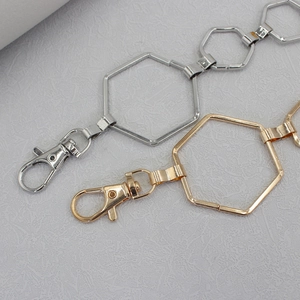 Adjustable hexagonal metal waist chain in gold and silver finish with lobster clasp