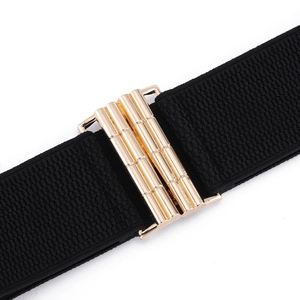 Elastic black waist belt with gold interlocking buckle and bamboo texture for dresses
