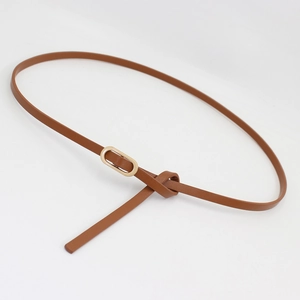 Minimalist brown slim leather belt featuring a golden oval buckle on a plain white background