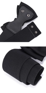Détail de la ceinture élastique noire avec tissage en nid d'abeille et boutons-pression
