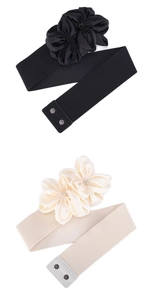 Detail van elastische tailleriemen met stoffen bloemen en drukknopen in zwart en beige