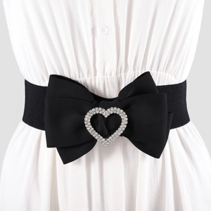 Ceinture élastique noire élégante avec grand nœud papillon et décor de cœur strass