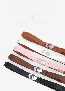 Detail view of oval zinc alloy moon star buckles and high-quality leather waist belts