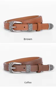 Detail of vintage carved silver buckles on brown and coffee slim western belts