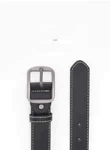 Detail of classic black leather belt with matte alloy buckle and contrast stitching