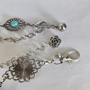 Vintage silver metal waist chain with turquoise gemstone and floral pendants for dresses