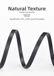 Close-up of flexible black synthetic PU leather belt with natural texture and soft finish