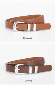 Detail view of brown and coffee slim leather belts with polished silver double rings