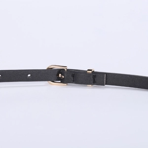 Minimalist black slim leather belt with a golden D-shaped buckle for dresses