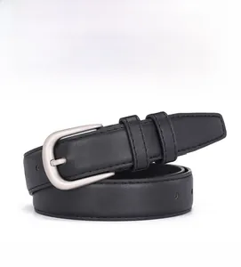 Detail of classic black leather belt with a matte silver prong buckle for women