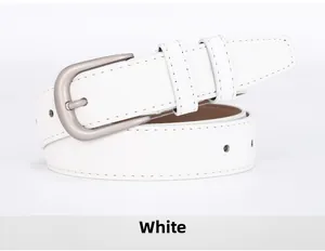 Detailed macro shot of white leather belt edge with fine stitching and matte silver buckle