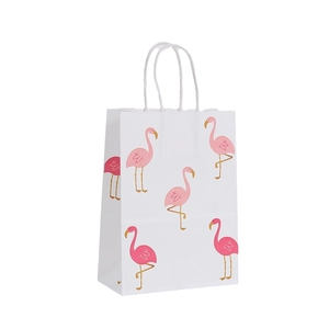 White kraft paper gift bag with pink flamingo print and twisted handles for party favors