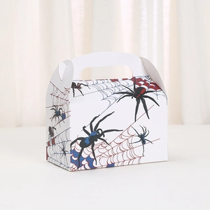 Detail of spider web pattern on white Halloween paper gift box with handle design