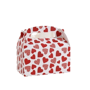 White cardboard gift box with red heart patterns and LOVE text for Valentines Day