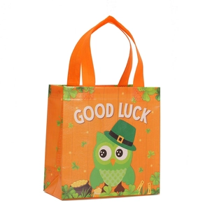 St. Patrick's Day non-woven gift bag with green owl, shamrock prints and orange handles