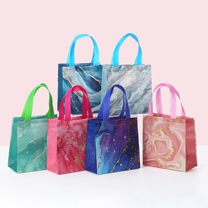 Detailed set of vibrant non-woven marble print gift bags with wide matching handles