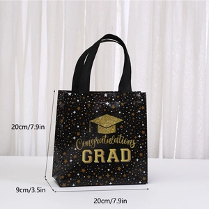 Detail of graduation gift bag showing gold glitter cap and Congratulations GRAD text