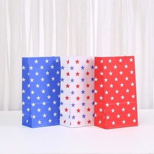 Set of three Independence Day paper gift bags with red, white, and blue star patterns
