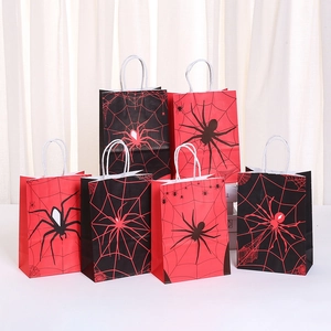 Halloween gift bags with spider web patterns in red and black colors for parties