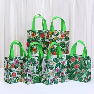 Set of 6 Hawaiian tropical floral non-woven gift bags with green handles for shopping