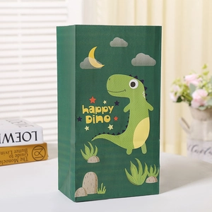 Sac cadeau vert en papier kraft avec motif dinosaure et texte happy dino pour anniversaire