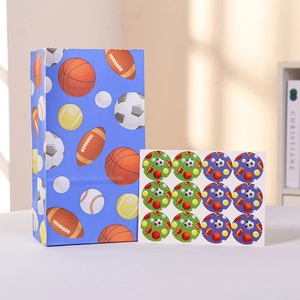 Blue sports-themed paper gift bag with matching ball pattern stickers for parties