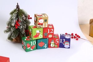 Close-up of numbered Christmas countdown gift boxes with festive holiday illustrations