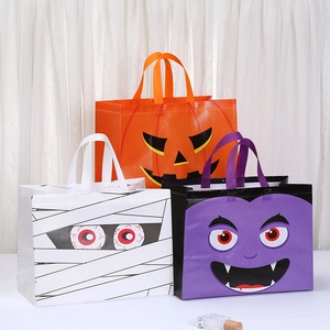 Three-piece Halloween gift bag set featuring pumpkin, mummy, and vampire cartoon designs