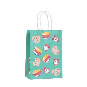 Green back-to-school gift bag with stationery prints and durable rope handles