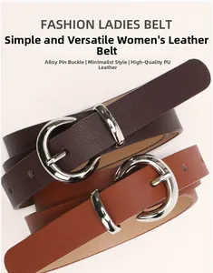 Close-up of alloy round buckle on textured brown PU leather belts for women