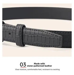 Close-up of black stone-textured leather belt featuring detailed embossing and stitching