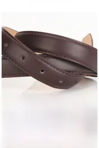 Detailed close-up of dark brown PU leather belt showing fine stitching and smooth grain