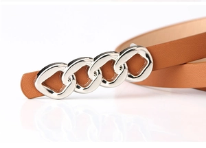 Close-up of brown leather belt with four silver interlocking metal rings and fine texture