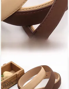 Detail of matte PU leather women's belt with fine stitching and minimalist square buckle