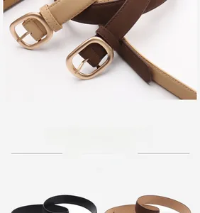 Detail of minimalist women's nubuck belts in black and brown with matte gold buckles