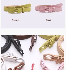 Detailed view of women's skinny belt featuring a floral buckle and colorful leather straps