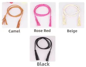 Dettaglio di cinture intrecciate con nappe nei colori cammello, rosa, beige e nero