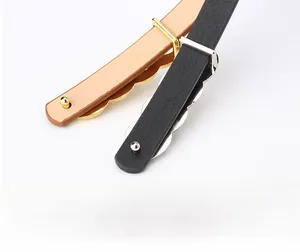 Detail of elegant waist belts with wave-shaped metal lining and secure stud closure