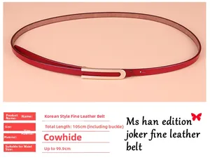 Détail de la ceinture fine en cuir de vachette rouge agate avec boucle dorée en U