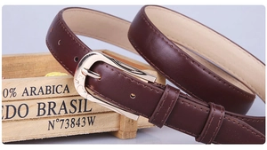 Close-up of dark brown PU leather belt with premium gold alloy pin buckle and fine stitching