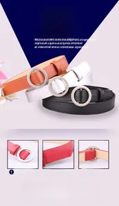 Detail view of the sleek silver round alloy buckle on a stylish PU leather belt for women