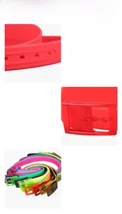 Close-up of flexible silicone belt straps with matching plastic buckles in multiple colors