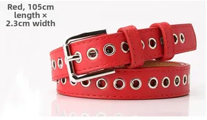 Detail view of red grommet belt with silver eyelets and buckle measuring 105cm x 2.3cm