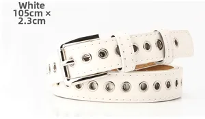 Detailed view of a white PU leather belt with multiple silver metal eyelets and buckle