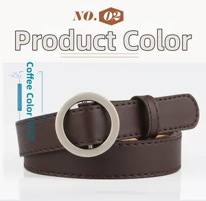 Detail of dark coffee PU leather thin belt featuring a round silver metal buckle