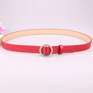 Elegant thin red faux leather belt for women featuring a round silver metal buckle design