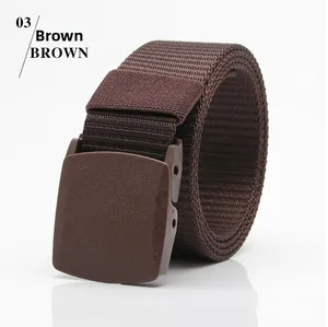 Close-up of brown nylon tactical belt with durable plastic buckle in a rolled view