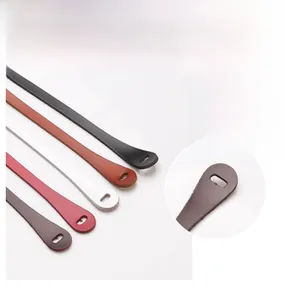 Detail of colorful leather thin waist belts for dresses showing diverse color options