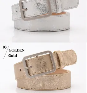 Detail view of gold and silver textured PU leather belts with matte gray square buckles